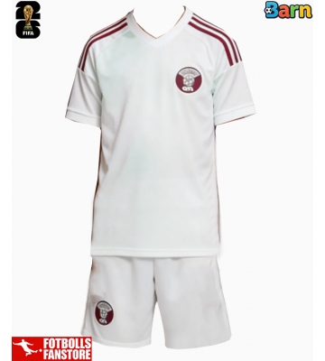 Qatar Bortatröja Barn VM 2026 Kortärmad (+ Korta byxor)